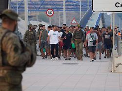 escorted by the spanish army migrants who crossed into spain return to morocco from the spanish enclave of ceuta on saturday aug 1 2026