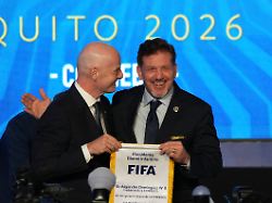fifa president gianni infantino left and conmebol president alejandro dominguez attend the conmebol congress in quito ecuador thursday april 23 2026