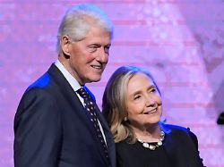 file former president bill clinton left and former secretary of state hillary clinton listen as vice president kamala harris delivers a eulogy for u s rep sheila jackson lee aug 1 2024 in houston