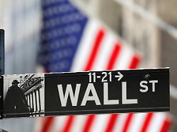 file photo a street sign for wall street is seen outside the new york stock exchange nyse in new york city new york u s july 19 2021
