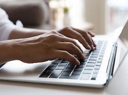 female hands typing on laptop keyboard close up cropped shot busy freelancer working use on wireless computer ordering goods on line chatting