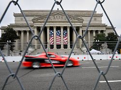 iroc cars drive past the national archives building prior to sunday s freedom 250 grand prix auto race in washington saturday aug 22 2026