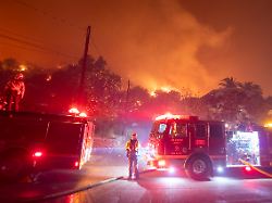 january 8 2025 los angeles california united states firefighters battle the eaton fire as it burns in the sierra madre east side of los angeles california