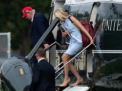 president donald trump and executive assistant natalie harp step off from marine one upon they arrival at the ellipse just outside of the white house sunday aug 16 2026 in washington