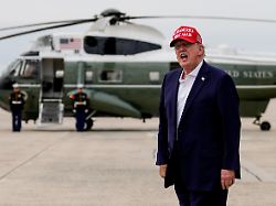 president donald trump yells to reporters after disembarking air force one sunday aug 16 2026 at joint base andrews md