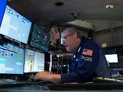 specialist gregg maloney works on the floor of the new york stock exchange monday aug 17 2026 in new york