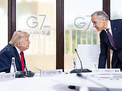 the canadian press 2026 06 16 prime minister mark carney and u s president donald trump speak at the g7 working luncheon in evian les bains france on tuesday june 16 2026