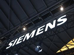 the siemens logo is seen at the shanghai new expo center during the waic conference 2026 in shanghai china