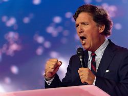 tucker carlson speaks during americafest the first turning point usa summit since the death of charlie kirk in phoenix arizona u s december 18 2025