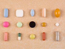 various colorful pills capsules and tablets flat lay vitamins perscription drugs painkillers nutritional supplements and antidepressants big pharma