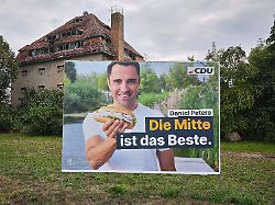 613626884